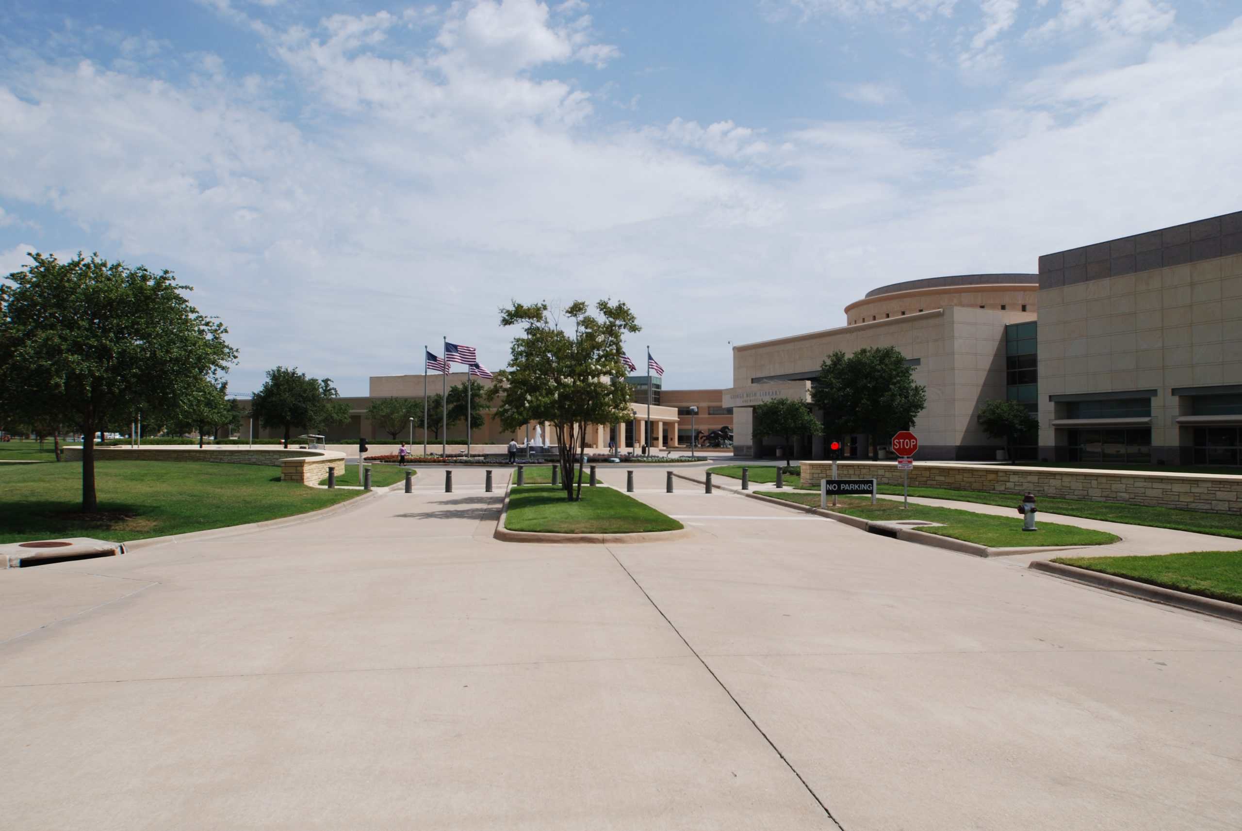 High-quality alt text for a community building exterior with landscaped grounds, highlighting expert electrical solutions by Britt Rice Electric.