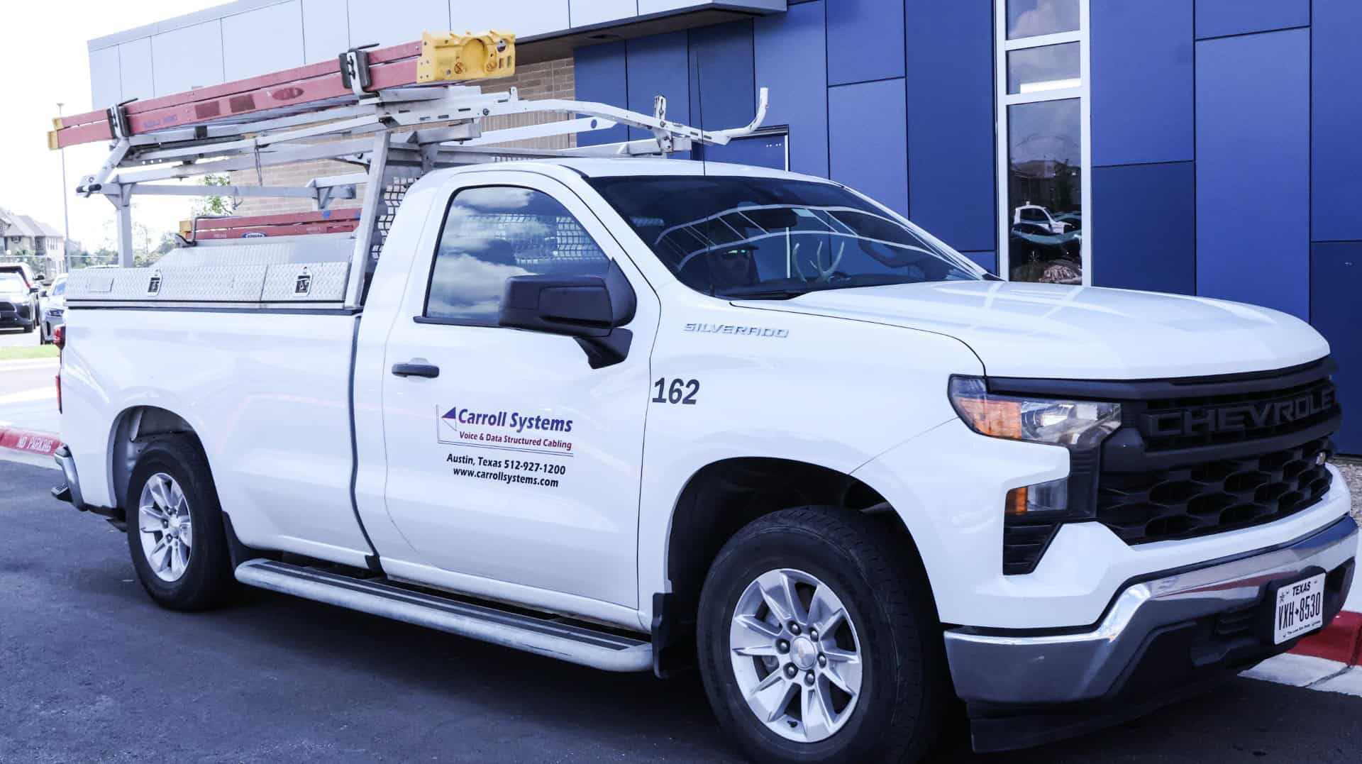 Utility truck with ladder and tools at Britt Rice Electric, LLC.